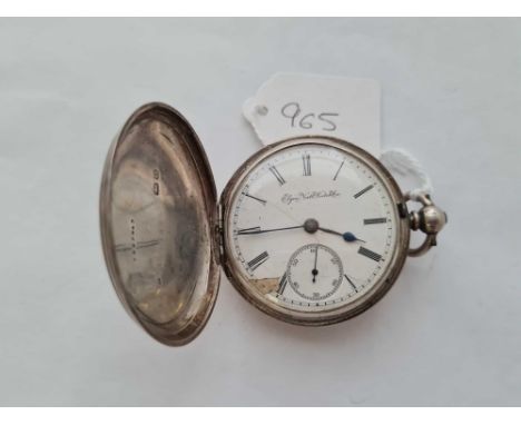 A gents silver pocket watch by Elgin with seconds sweep - the outer case has double crest, slight damage to face