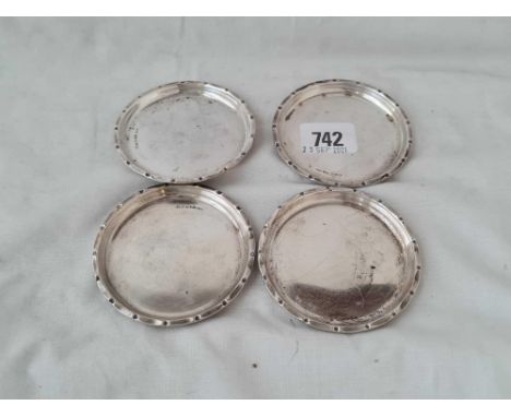 A set of four continental silver circular dishes - 3" diameter - 102 g.