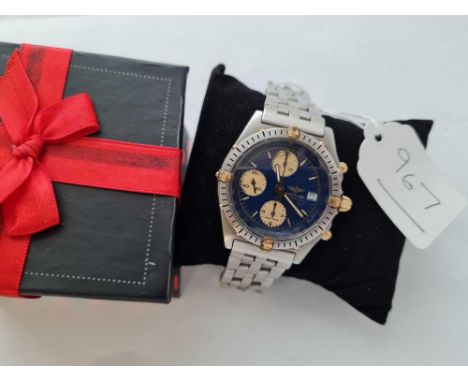 A STAINLESS STEEL BREITLING THREE DIAL WRIST WATCH with seconds sweep and calendar aperture - No. to rear 81.950 B13047 - On 