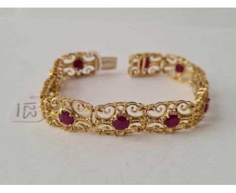 A NICE RUBY BRACELET 9CT - 26 GMS 