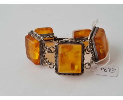 a silver and reconstituted amber bracelet 