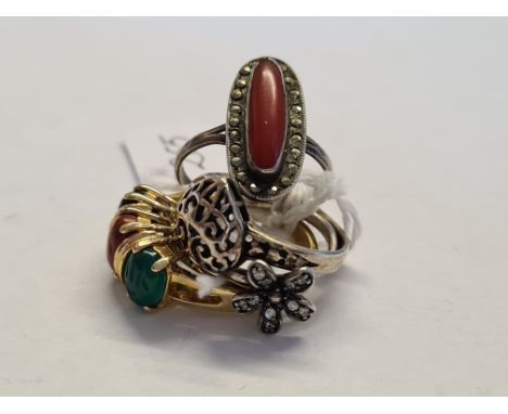 Four silver stone set rings