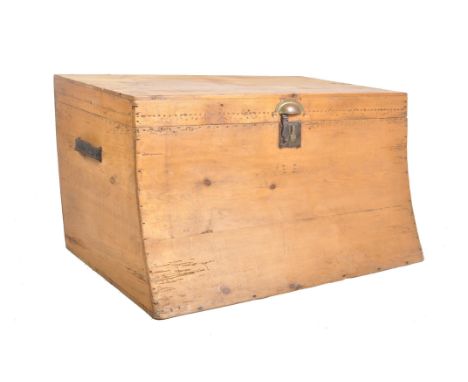 A Victorian 19th century slope fronted pine wood ship style trunk chest trunk. The chest having a straight rectangular top ov