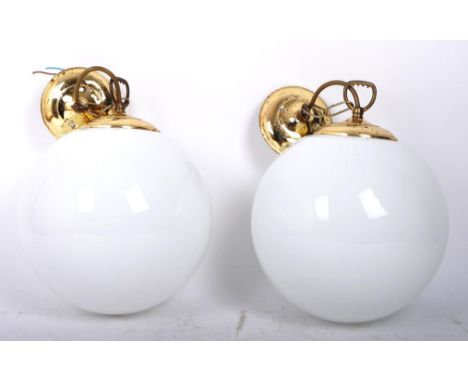 A pair of retro 20th century gilt metal &amp; milk glass globe spherical ceiling lights. Each with chain loops holders. each 
