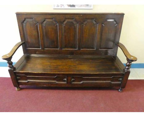 An early 19th Century 5 panel oak box settle