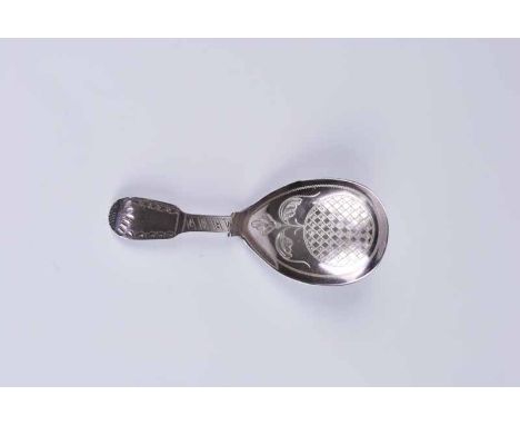 A Regency silver caddy spoon with brightcut decoration to the fiddle pattern handle and teardrop bowl, London 1821 by Henry &