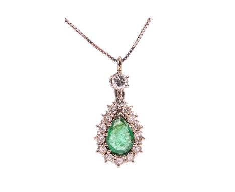 An emerald and diamond cluster pendant on chain, centred with a pear-cut emerald of 9.3 x 6.9 x 3.4 mm, claw-set within a dia