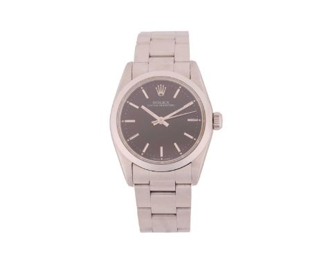 RolexLadies Oyster Perpetual Wristwatch Model: 67480Serial: W379195Year: 2000sCase Material: Stainless Steel Case Diameter: 3