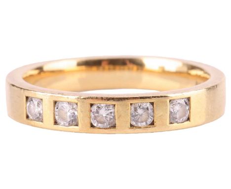 A diamond-set dress ring in 18ct yellow gold, comprising five brilliant-cut diamonds with an estimated total weight of 0.20ct