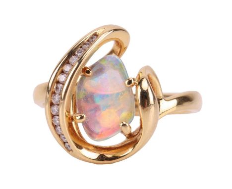 An opal and diamond dress ring, featuring a free-form precious opal slice of 10.1 x 7.0 x 1.1 mm, displaying vibrant spectral