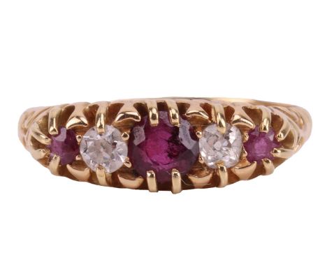 An Edwardian ruby and diamond-set half-hoop ring, claw-set with three rubies and two old-cut diamonds, the largest central ru