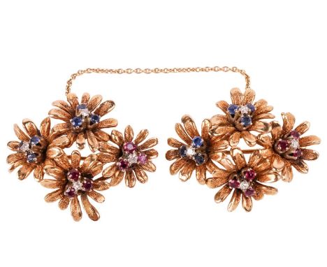 A pair of gem-set daisy collar brooches, each containing a lozenge cluster of flowerheads with diamond, sapphire and ruby acc