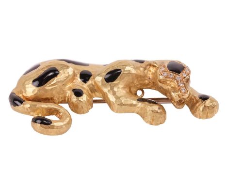A diamond-set brooch pendant in the form of a stylised leaping leopard, spots adorned with black enamel on a planished finish