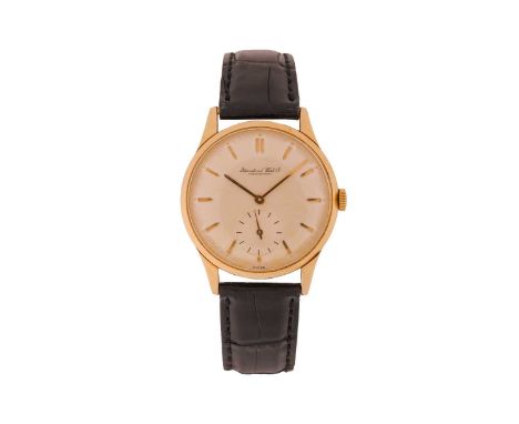 IWCA 14 Carat Gentleman's Wristwatch Serial: 118551Year: Approx 1960sCase Material: 14 Carat Gold Case Diameter: 36mmDial: Si