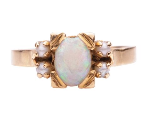 An opal and seed pearl dress ring, featuring an opal cabochon measuring approximately 6.8mm x 5.2mm, in an angular claw setti