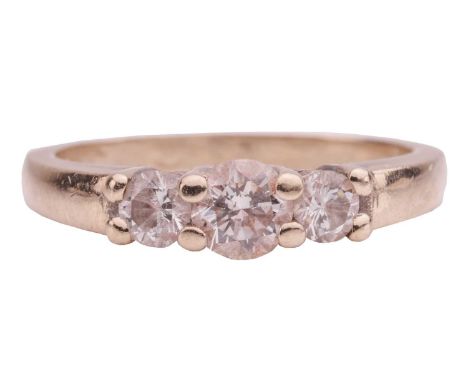 A diamond trilogy ring, comprising three graduated round brilliant-cut diamonds, with an estimated total weight of 0.50ct, to