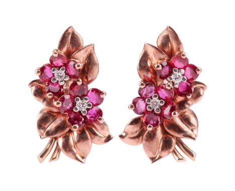 A pair of floral spray earrings set with a mixed of natural and synthetic rubies, circa 1950s, each containing two flowerhead
