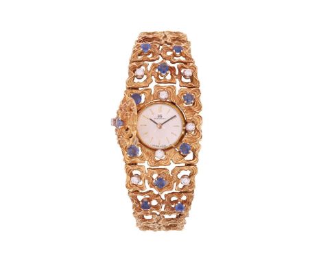 Bucherer -  a modernist cocktail watch set with diamond and sapphire, comprising a series of tapered abstract hinged links, s