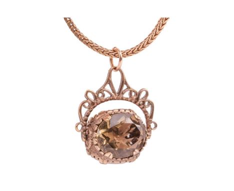 A swivel fob pendant on chain, the three-sided swivel fob seal set with two oval-cut citrines and a smoky quartz, to a scroll