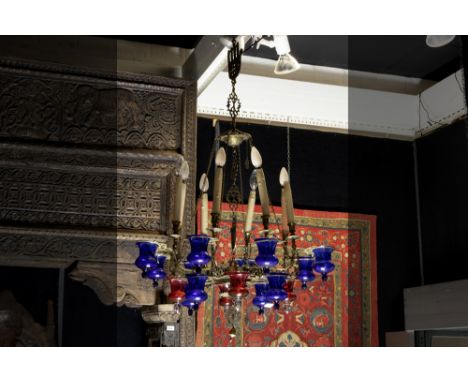 quite special Near East chandelier in brass with blue and red glass (oil)lamps || Speciale 'antieke' luster uit het Nabije Oo