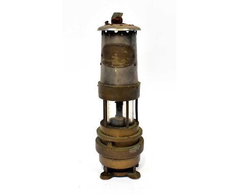An early 20th century Naylor spiral arm type safety lamp, height 30cm.