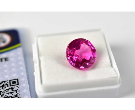 Standard VAT A loose 8.30 carat round ruby with GIL Laboratory Certificate.