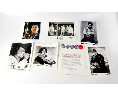 A collection of signed black and white photographs comprising Donald Byrd, Tommy Smith, V.S.O.P II, Jnr. Walker and two of Ja