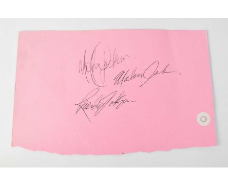 THE JACKSON FIVE; a piece of paper bearing the signatures of Michael Jackson, Randy Jackson and Marlon Jackson. Condition Rep