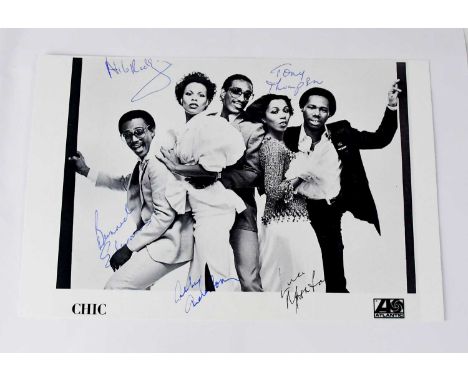 CHIC; a black and white photograph bearing the signatures of the band, Nile Rodgers, Tony Thompson, Alfa Anderson, Bernard Ed