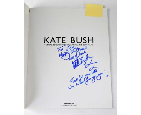 KATE BUSH; 'A Visual Documentary' by Kevin Cann &amp; Sean Mayes, bearing signature and dedication to inner title page.Condit
