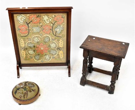 A Victorian beaded mahogany footstool with inlaid rim, to three supports, an early 20th century oak stool to baluster support