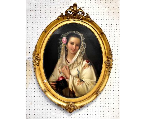 UNATTRIBUTED; Continental oil, 19th century portrait of young woman holding a mask, 75 x 56cm, in oval gilt frame. 
