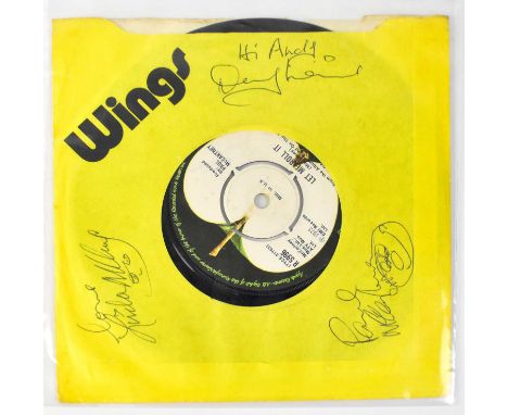 PAUL MCCARTNEY AND WINGS; a 45rpm vinyl single 'Jet', bearing signatures of Paul McCartney, Linda McCartney and Denny Lane to