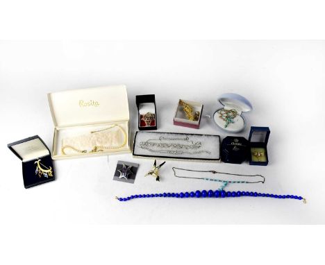 A quantity of vintage and contemporary costume jewellery, to include a diamanté necklace and matching bracelet, a boxed Rosit