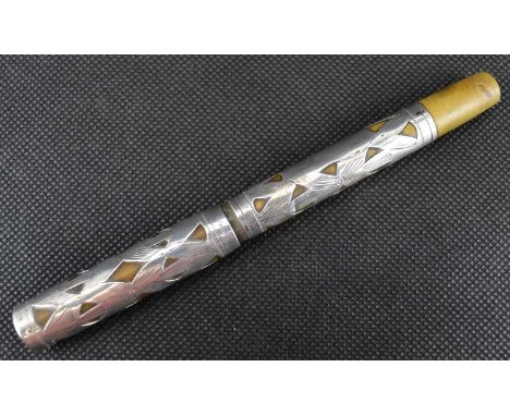 WATERMAN; an early 20th century sterling silver fountain pen, no.452, with pierced floral sterling silver outer case, lacking