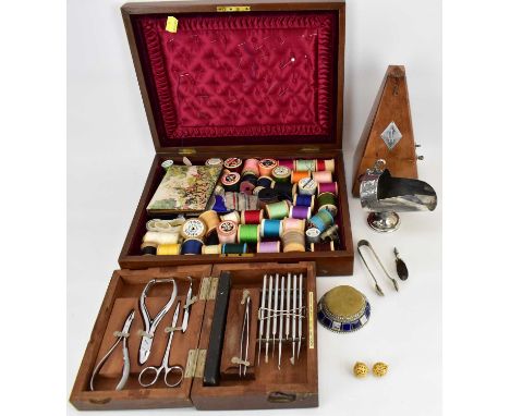 A case of military issue 1940 chiropody instruments, with broad arrow to the top, a metronome, a mahogany box with inset shie