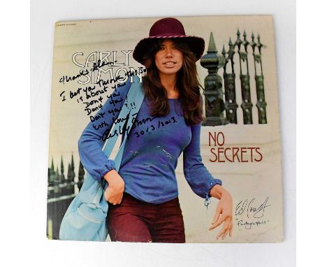 CARLY SIMON; LP 'No Secrets', bearing signature and song lyric, also signature of Ed Caraeff, photographer.Condition Report: 