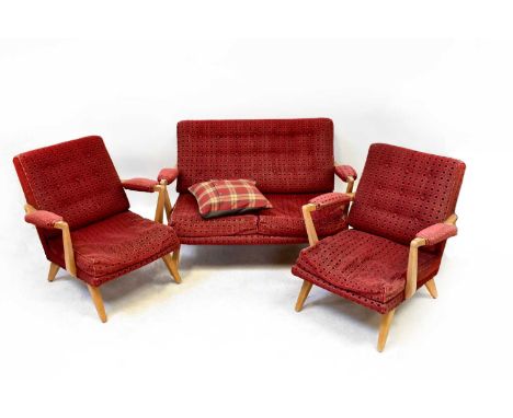 G-PLAN; a mid-20th century three-piece suite comprising a two-seat sofa and two matching armchairs, covered in red, black and