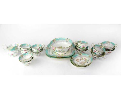 A 19th century feldspar porcelain Indian Tree style part tea service, no.3084, comprising cups, saucers, milk jugs, cake plat
