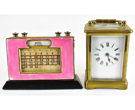 A French brass and glazed side carriage clock, the white enamelled dial set with Roman numerals, height 14cm, together with a