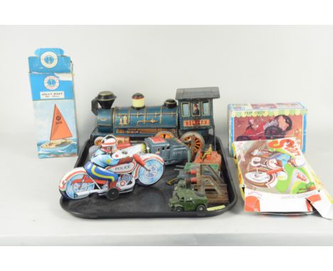 A boxed Scalex 'Jolly Boa' toy yacht, a boxed 'Clown Buggy' tin plate train and motorcycle plus vintage play worn Dinky's