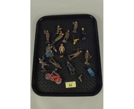 A selection of vintage lead figures, some Britains including articulated soldiers and motorbike