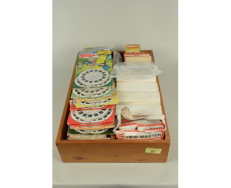 A large collection of Viewmaster reels including vintage packaged reels, 'Barbie and Rockers', 'The Perishers', 'My Little Po