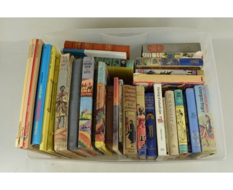 A box of mixed vintage childrens annuals and story books including Enid Blyton etc