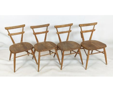 ATTRIBUTED TO ERCOL CHILDREN'S CHAIRS, a set of four, with elm seats, each 36cm W x 65cm H. (4) 