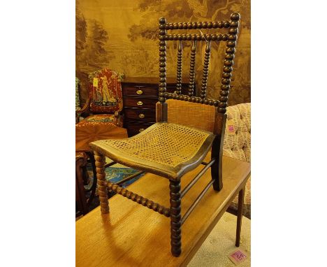 HALL CHAIR, late 19th century, bobbin turned, original canework seat, beech frame, 81cm H x 41cm W x 49cm D. 