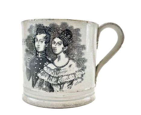 A Victoria &amp; Albert commemorative marriage mug. Printed in black with the Royal Coat of Arms and a double portrait, dated