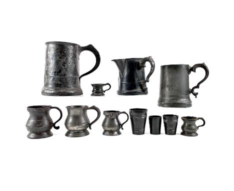 A 19th century pewter tankard initiated I S M Ship 7 to the base. Height 15cm together with a collection of other pewter item