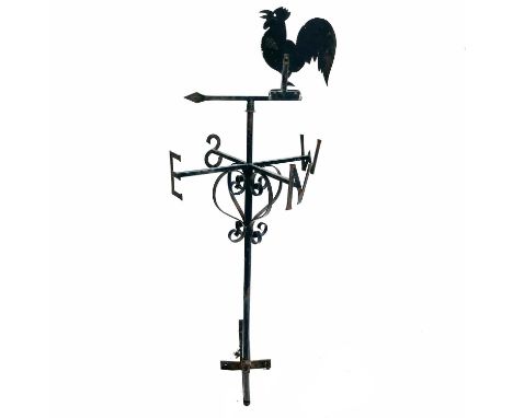 A wrought iron weather vane with cockerel decoration.  Height 132cm.