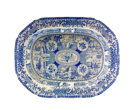 A blue and white pearlware meat plate. Circa 1810, printed with a Chinoiserie subject of figures and scholars in garden setti